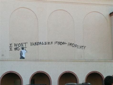 Graffiti On The Side Of A Building That Says I Wont Vandalize Show