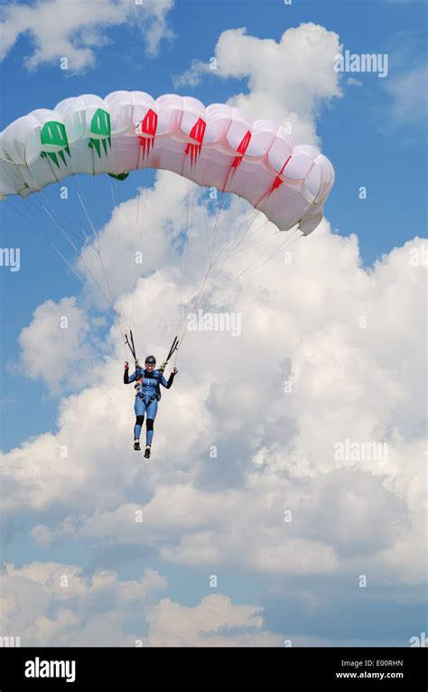 One Day With Parachutist In Airfield The Girl Skydiver Lands Under The