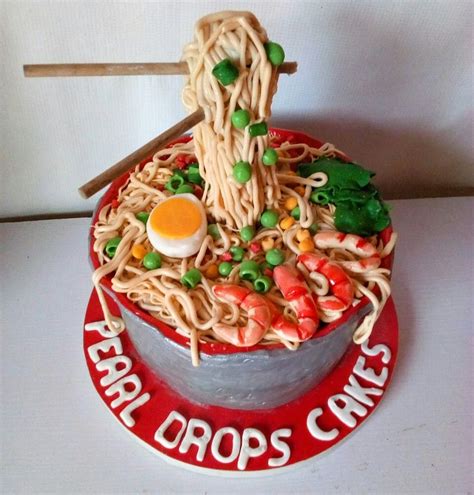 A Cake Made To Look Like Noodles And Vegetables