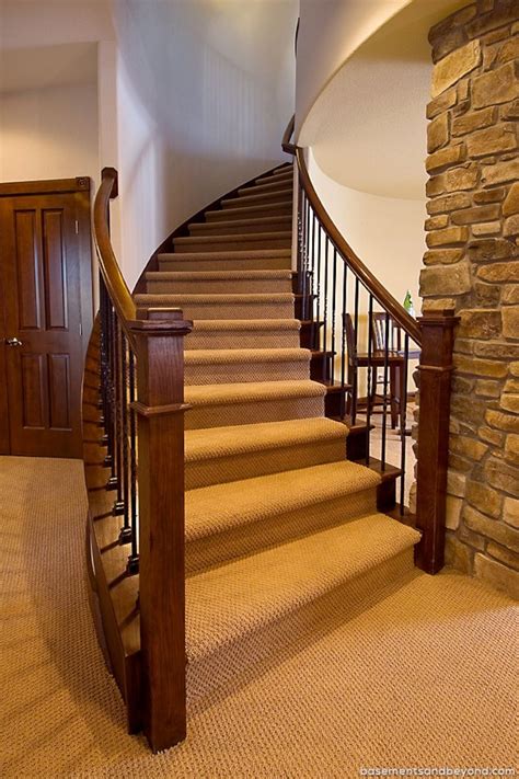 These stairs are painted and distressed with a carpet runner. curved staircase basement | Award Winning Luxury Basement ...