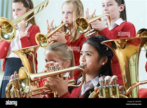 Group Of Students Playing In School Orchestra Together Stock Photo Alamy