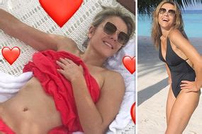 Elizabeth Hurley Squeezes Eye Popping Assets Into Plunging Bikini The Best Porn Website