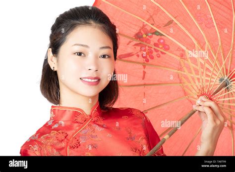 beautiful chinese woman wearing a traditional dress known as a cheongsam or chipao isolated on a