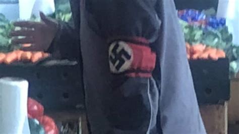 Shocked Man Photographed Wearing Swastika Armband At Melbourne Market