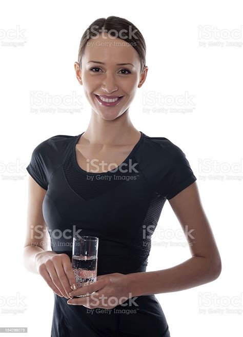 Young Woman With A Glass Of Water Stock Photo Download Image Now