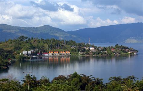 Samosir island within the lake is an island within the island of sumatra. lake-toba
