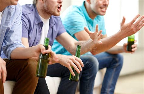 Happy Male Friends With Beer Watching Tv At Home Stock Image Image Of