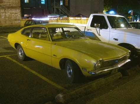 OLD PARKED CARS.: 1970 Ford Maverick Fastback.