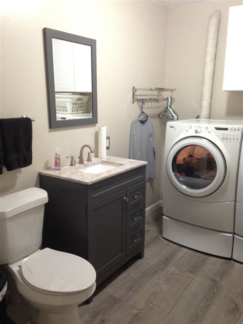 My hot water heater is there, as well as hot/cold water pipes and a floor drain. Updated combo half bath & laundry room. | Bath laundry ...