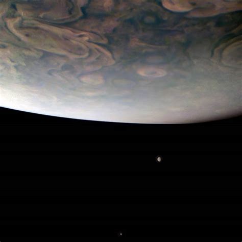 nasa s juno captures two of jupiter s largest moons science environment