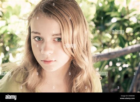 Closeup Outdoor Portrait Of Beautiful Blond Caucasian Teenage Girl In A