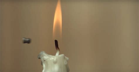 Watch A Bullet Put Out A Candle Flame In Extreme Slow Motion