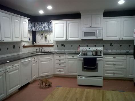 Black pearl is a great option because it is consistent and a great value. Blue Pearl with White Cabinets? | Backsplash with white ...