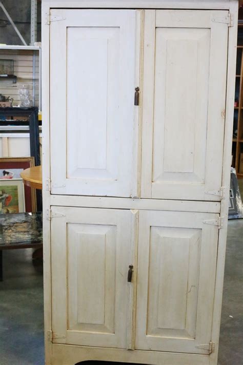 Cabinet in the kitchen sideboard in the entryway bookcase in the living room or a storage cabinet in the bathroom? LARGE RUSTIC PINE 4-DOOR STORAGE CABINET