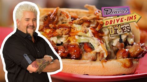 guy fieri eats a cheesy bbq pork chislic sandwich diners drive ins and dives food network