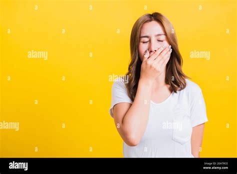 Woman Emotions Tired And Sleepy Her Yawning Close Mouth Open By Hand