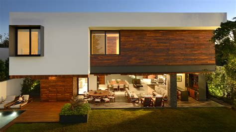 The living room is your home's centre. Atrium House: A Home With a Palette of Wood, Steel and ...