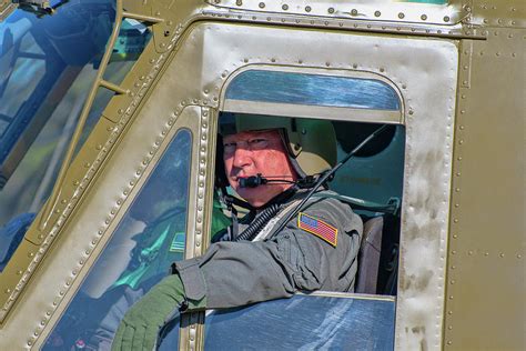 Us Army Huey Uh1 Helicopter Pilot Photograph By Timothy Wildey Fine