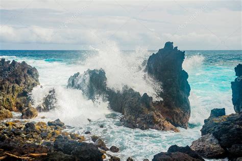 Large Waves Crashing Over Rocks — Stock Photo © Joshuarainey 189100018