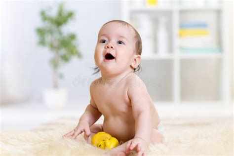 Baby Sitting On Floor At Home Stock Image Image Of Lifestyle Diaper