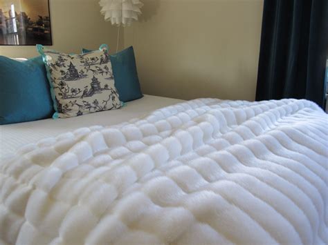 Furry blankets are the perfect props for baby photo shoots. Luxury Faux Fur Blanket Queen - HomesFeed