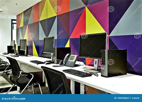 Modern Computer Office With Call Center With Colorful Wall Stock Image