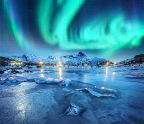 Northern Lights Above Snowy Mountains Frozen Sea Coast Stock Image