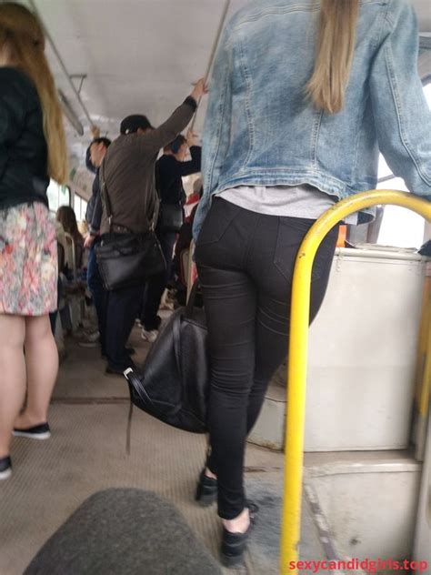 sexycandidgirls top nice booty in tight black jeans in public bus creepshot item 1