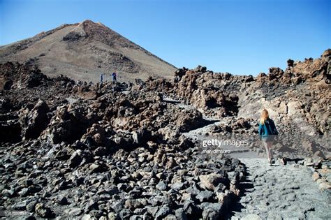 Three People Walking Along Footpath Mt Teide Tenerife Canary Islands