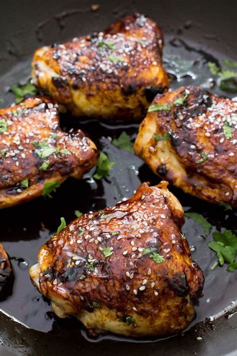 Sticky Tender Asian Chicken Thighs Smothered In A Sweet And Spicy Asian
