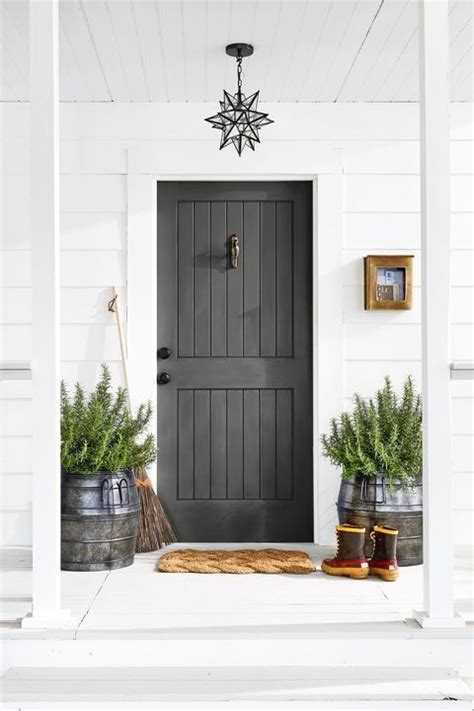 Try dark metal doors for. SW Iron Ore | Painted front doors, Front door paint colors ...