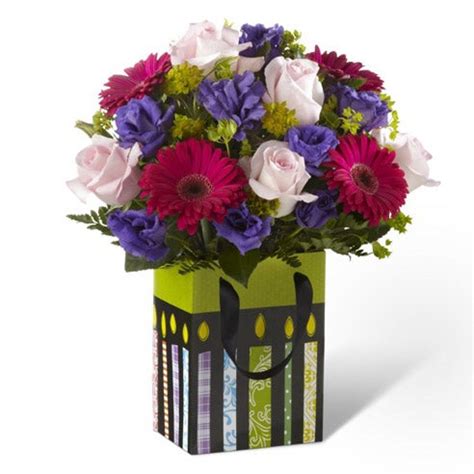 Our local florist handcraft a colorful array of flowers in a clear glass vase to create a celebration in bloom. The FTD® Perfect Birthday Gift Bouquet at Send Flowers
