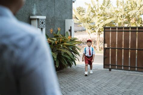 Exciited Elementary Student Coming Back Home Stock Photo Image Of