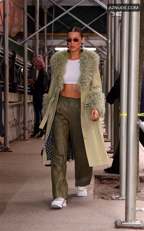 Bella Hadid Goes Braless Under A See Through White Top While Arriving