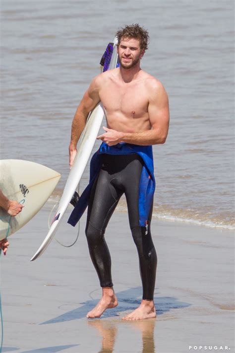 Liam Hemsworth Shirtless While Surfing In Australia Popsugar Celebrity Photo