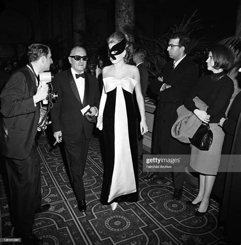 A Couple In Masks Arriving At Truman Capotes Black And White Ball In