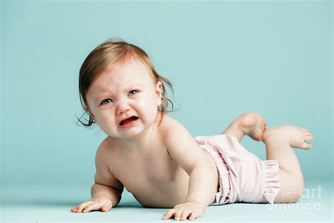 Crawling Baby Girl Crying On The Floor Photograph By Michal Bednarek