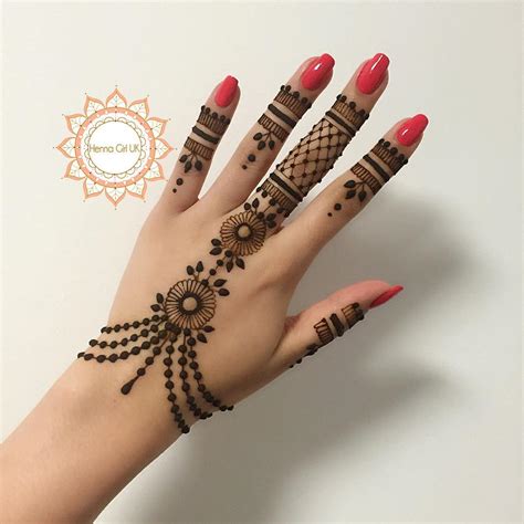 Intricate bridal back hand mehndi design: 125+ New Simple Mehndi/Henna Designs for Hands - Buzzpk