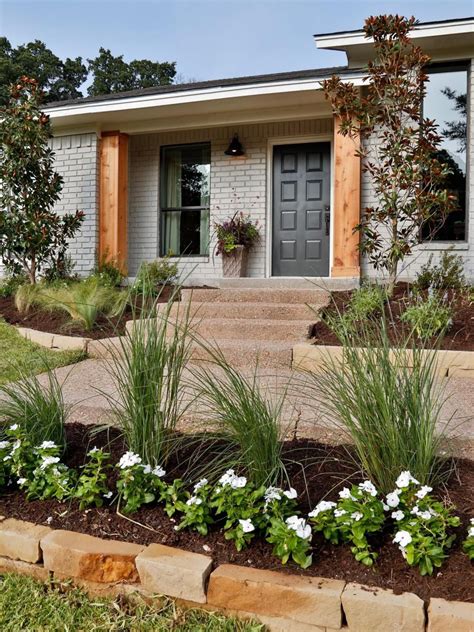 Are there any general principles/guidelines to follow for planning a landscape for this style of home? Overgrown shrubs have been replaced with fresh landscaping ...