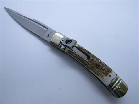 Switchblade knives were the assault weapons of their day. AKC ITALY STAG SWITCHBLADE AUTOMATIC KNIFE LEVER