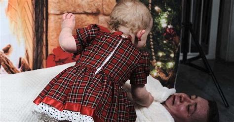 Sassy Toddler Refuses To Pose For Christmas Photoshoot Forcing Dad To