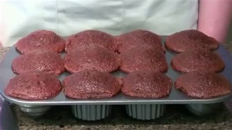 Use the flat side that is longer than the diameter of the scoop. Filled Cupcake Pan - YouTube