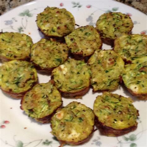 Grease a mini muffin tin with cooking spray. Zucchini Tots- yummy- my version of a recipe I pinned here ...