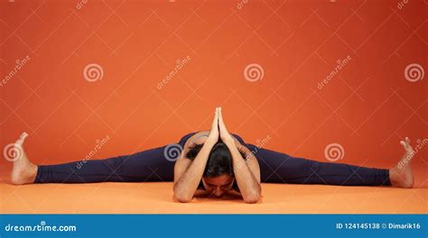 Wide Angle Seated Forward Bend Yoga Pose Stock Photo Image Of Bend