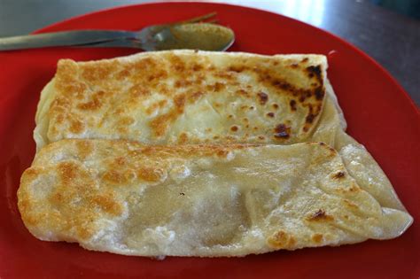 Simple banana leaf nasi lemak and teh tarik breakfast. Penang Transfer Road Roti Canai - Asia Pacific - Hungry ...