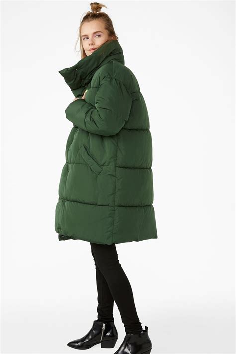 Maybe you would like to learn more about one of these? Monki | Long puffer coat, Puffer coat outfit, Long green coat