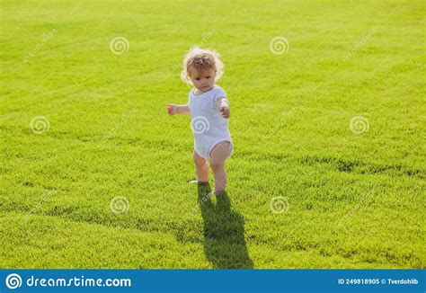 Adorable Baby Boy Outdoors Posing On Green Grass Healthy Child Stock