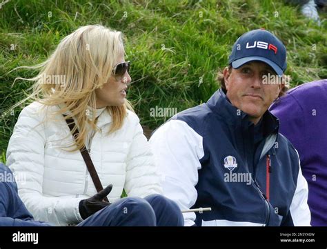 Phil Mickelson Of The Us And His Wife Amy Watch The Foursomes Match Between Jim Furyk And Hunter