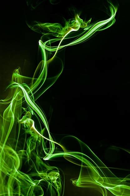 Premium Photo Green Smoke Motion On Black Background
