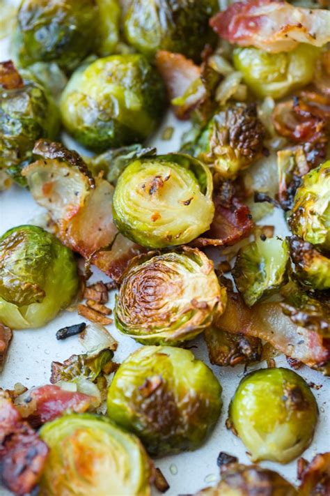 2.prepare vegetables, slicing into equal sizes so they cook evenly. Crispy Roasted Brussels Sprouts with Bacon - A Saucy Kitchen
